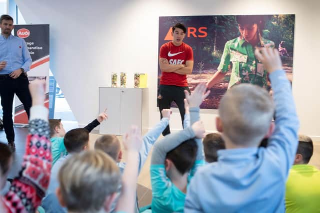 Luke takes questions from the youngsters. Photo: The Bigger Picture Agency Ltd.