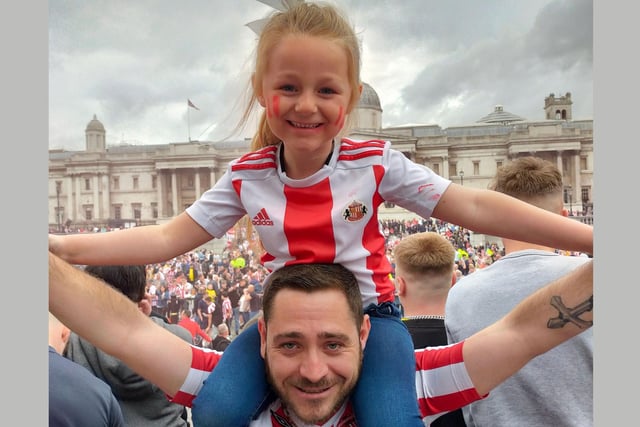 Jamie Turnbull with his daughter Maddeline Turnbull, 6 in Trafalgar Square.