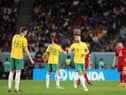 Bailey Wright of Australia talks with teammates during the FIFA World Cup Qatar 2022 Group D match between Australia and Denmark at Al Janoub Stadium.
