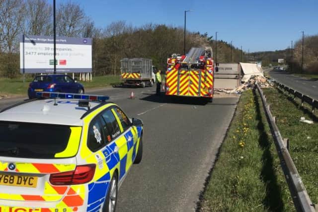Northumbria Police Road Safety - @NPRoadSafety - shared this photo of its officers and Tyne and Wear Fire and Rescue Service on the scene of the overturned lorry near Rainton Bridge.
