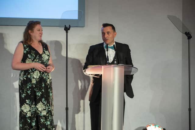 Archive Manager Graham Relton gives the acceptance speech and is accompanied by Collections Manager, Megan McCooley. © FOCAL/SA Images.