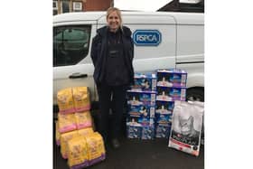 RSPCA Inspector Susie Micallef collecting a donation for the project.