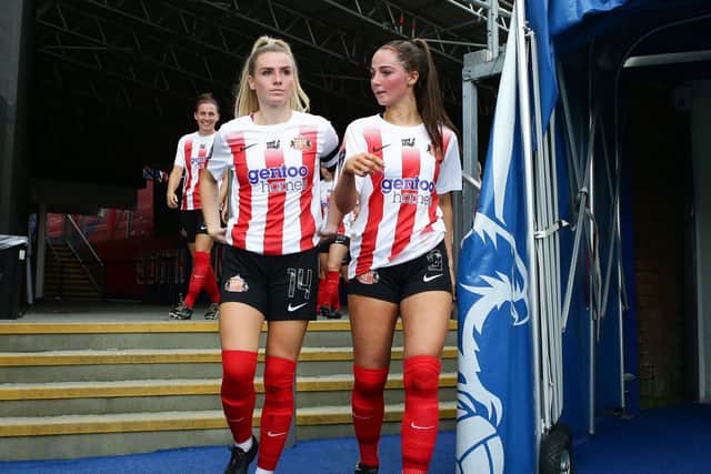 Emma Kelly and Neve Herron lead out their team for the second half during the Barclays FA Women's Championship match between Crystal Palace and Sunderland at Selhurst Park.