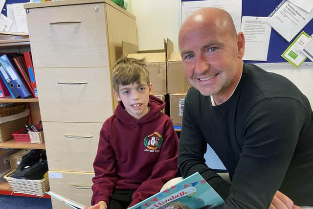 Retiring Seaham Trinity Primary School headteacher Ray Bushby with pupil Christopher Owen, 11. 

Picture by FRANK REID