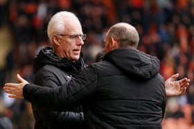 BLACKPOOL, ENGLAND - FEBRUARY 18: Mick McCarthy, Manager of Blackpool, interacts with Alex Neil, Manager of Stoke City, prior to the Sky Bet Championship between Blackpool and Stoke City at Bloomfield Road on February 18, 2023 in Blackpool, England. (Photo by Charlotte Tattersall/Getty Images)