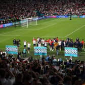 England players celebrate with the fans after their semi-final win over Denmark at Wembley.