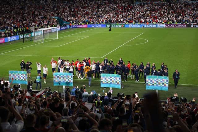 England players celebrate with the fans after their semi-final win over Denmark at Wembley.