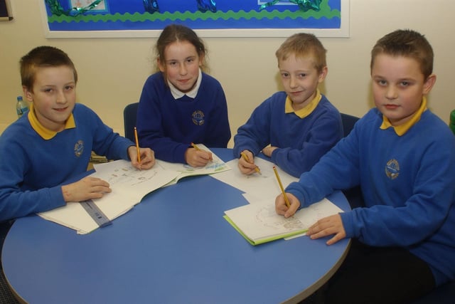 These pupils were working on their entries for a logo design competition when this photo was taken in 2006.