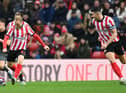 Danny Batth and Alex Pritchard playing for Sunderland.
