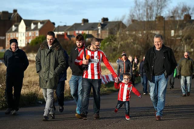 Sunderland fans walking to a match at the Stadium of Light.