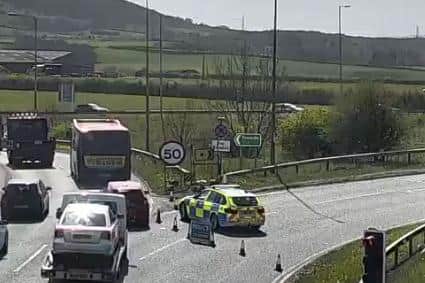 A still taken from a video shared by @NELiveTraffic, showing how police closed off the roundabout between the A1231 and A19 following the crash.