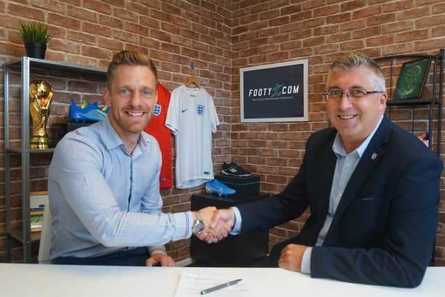 FOOTY.COM CEO Paul Lucherini with Colin Bridgford, CEO of the Manchester FA who are sponsored by the firm.