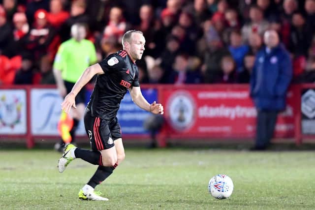 Dylan McGeouch in action at Accrington Stanley