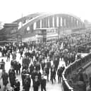 The old Wearmouth Bridge is used by a football crowd for the last time in April 1927. But the Antiquarians can tell you much, much more about this photograph.