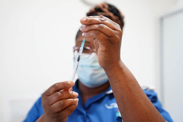 Covid booster vaccines: Who is eligable for the newest booster and how do I book a vaccine appointment? (Photo by  Jacob King - WPA Pool / Getty Images)