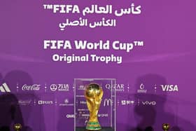 A general view shows the World Cup original trophy on display in the Qatari capital Doha on May 6, 2022, during an event marking 200 days to go until the 2022 FIFA World Cup. (Photo by KARIM JAAFAR / AFP) (Photo by KARIM JAAFAR/AFP via Getty Images)