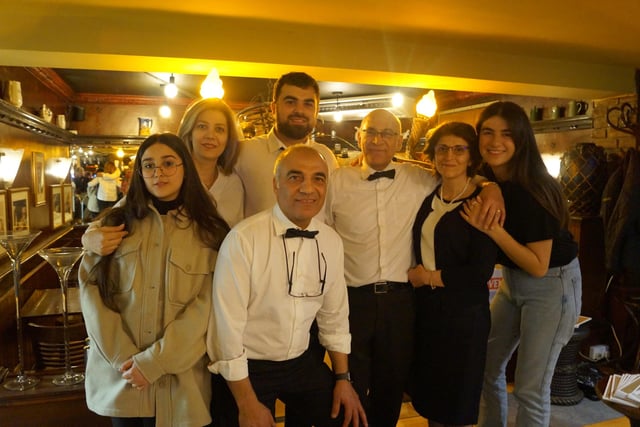 Owners Habib and Masoud Farahi with their family.