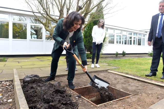 Sunderland Central MP Julie Elliott helps bury the new Thornhill Park School's time capsule.