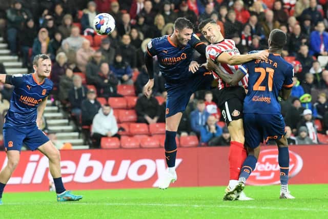 Danny Batth heads an effort wide for Sunderland against Blackpool.
