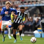 Anthony Gordon of Everton challenges Jacob Murphy of Newcastle United during the Premier League match between Newcastle United and Everton FC at St. James Park on October 19, 2022 in Newcastle upon Tyne, England. (Photo by George Wood/Getty Images)