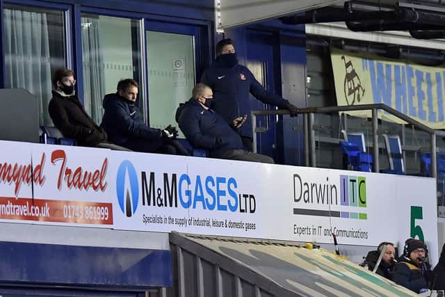 Kyril Louis-Dreyfus (left) is pictured with sporting director Kristjaan Speakman (second left) during Sunderland's loss against Shrewsbury Town on Tuesday.