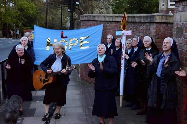 The nuns gathered on Tunstall Road to join in the Clap for Carers celebration.