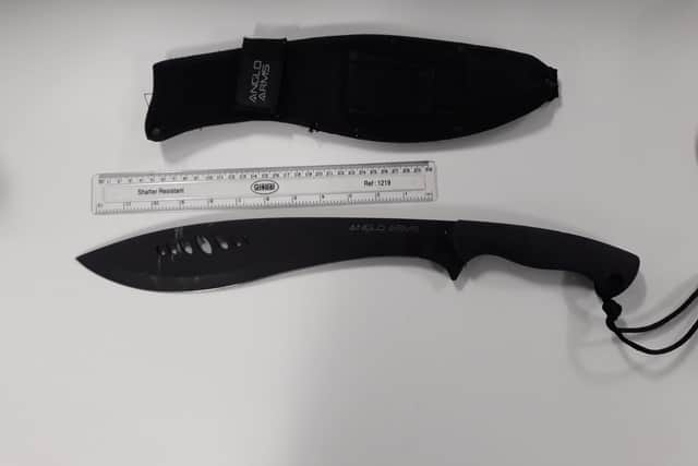 A 12 inch knife was discovered.