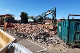 Section of the former fire station have already been reduced to rubble.