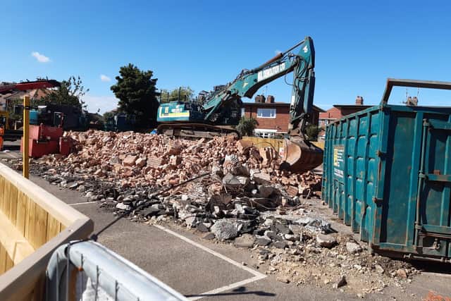 Section of the former fire station have already been reduced to rubble.