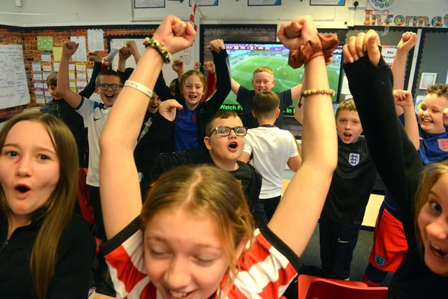 Plains Farm Academy pupils celebrate England's 6-2 victory over Iran in their opening World Cup Group B match.