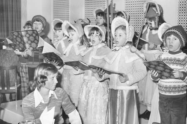 Binns was the place to be at Christmas - but was it your go-to for visiting Santa in his grotto? The carol singers give us a tune in December 1973.