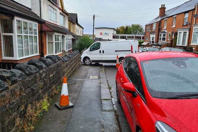 This van is not only blocking half of the road, but it is also obstructing pedestrians from getting past on the path.