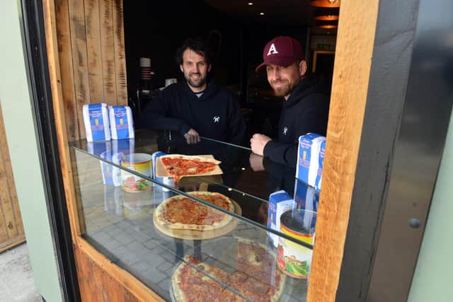 The Slice hatch has been created in a former storage area at the back of The Coal Face pub. Owners from left Mark Milroy and Andy Smith.