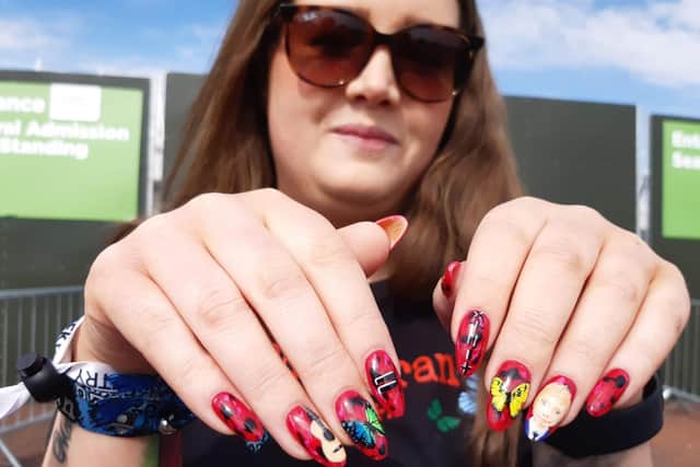 Emma's Sheeran-themed nails.