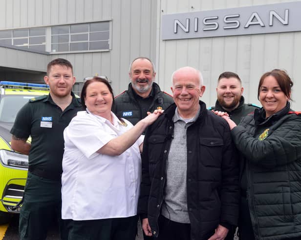 Frank with the NEAS team who saved his life