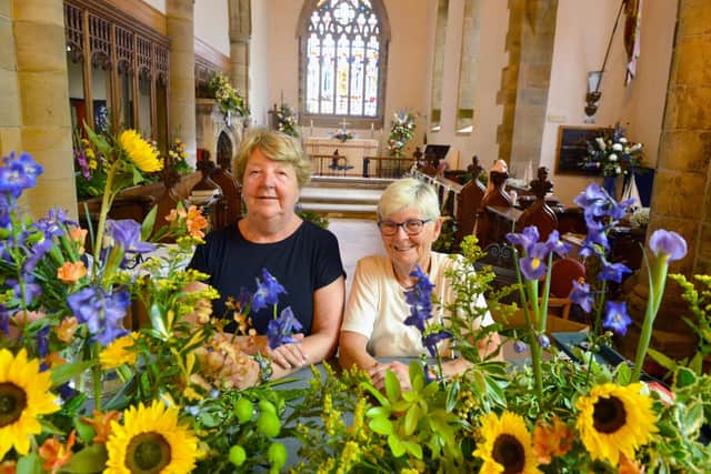 Flower Festival for St Peters Church anniversary with Herrington Flower Club chair Pauline Wiper and Sunderland Floral Art Club secretary Pam Jameson.