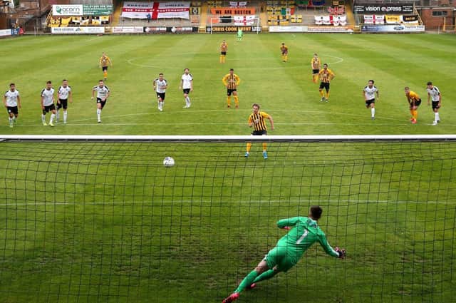 Thewlis of Boston scores his sides first goal from the penalty spot during the Vanarama National League North Play-Off Semi-final match between Boston United and Gateshead at  on July 25, 2020 in Boston, England. (Photo by Alex Pantling/Getty Images)