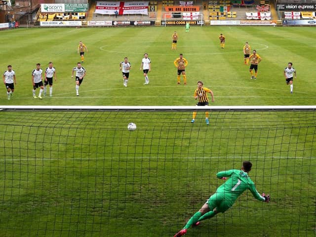 Thewlis of Boston scores his sides first goal from the penalty spot during the Vanarama National League North Play-Off Semi-final match between Boston United and Gateshead at  on July 25, 2020 in Boston, England. (Photo by Alex Pantling/Getty Images)