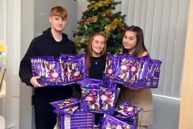 Sunderland College students Bailey Stevenson, Lucy Gettins and Erin Stewart with the collection of selection boxes for disadvantage children.