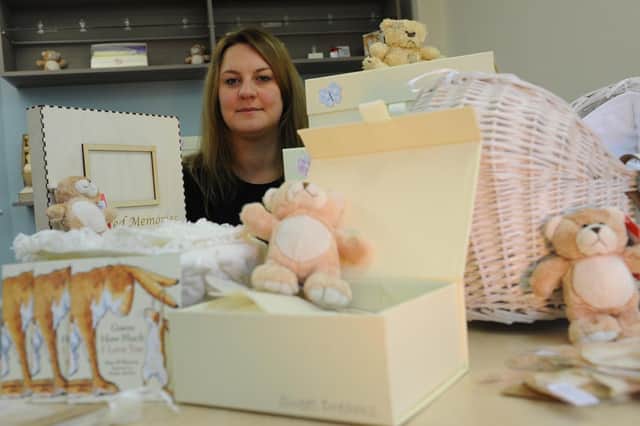 The founder of 4Louis, Kirsty McGurrell, with her memory boxes.