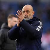 Nuno Espirito Santo, Manager of Nottingham Forest, applauds the fans after the team's defeat in the Premier League match at Brighton & Hove Albion