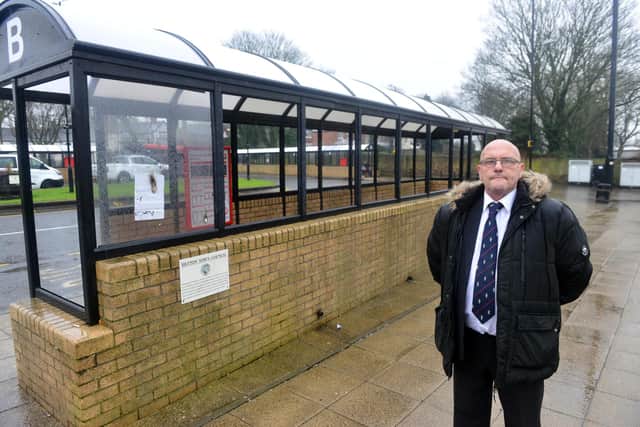 All 18 windows of the bus shelter have been smashed as town councillor David Geddis raises policing concerns.