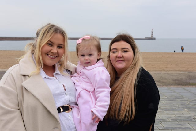 The light rain didn't stop Rebecca (left) and Katie Evans with Halle (1) of Peterlee spending the day at the beach.
