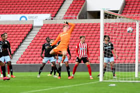 Morgan Feeney scores against Aston Villa U21s earlier this season