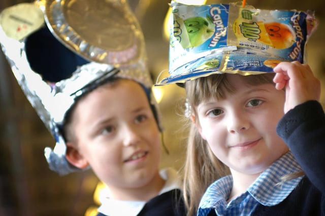 Nathan Slater and Harrie Jackson were winners in a school competition to make hats from recycled materials in 2009.
