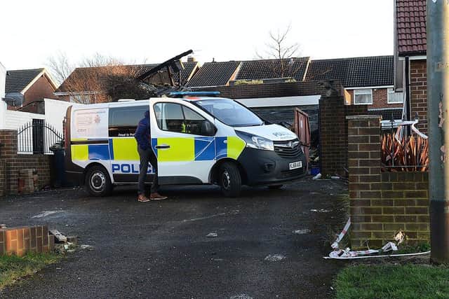 Police on the scene of the murder inquiry in Tunstall Village Green following a garage blaze last week. Picture by Frank Reid.
