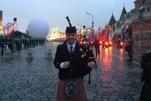 Alan's piping has been in demand around the world, including here in Moscow's Red Square.