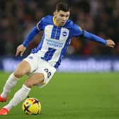 BRIGHTON, ENGLAND - DECEMBER 31: Julio Enciso of Brighton & Hove Albion runs with the ball during the Premier League match between Brighton & Hove Albion and Arsenal FC at American Express Community Stadium on December 31, 2022 in Brighton, England. (Photo by Steve Bardens/Getty Images)