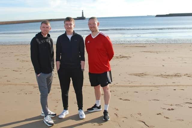 From left: Matthew Cook, Tom Harvey and John Longford, seen here preparing for the sands of the Sahara on the sands of Roker back in February.