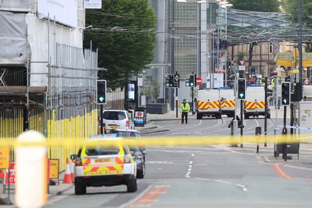The scene close to the Manchester Arena the morning after the terror attack at an Ariana Grande concert. Picture: Peter Byrne/PA Wire.